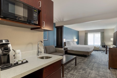 1 soverom, blendingsgardiner og strykejern/-brett