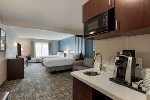 Blackout drapes, iron/ironing board, free cribs/infant beds