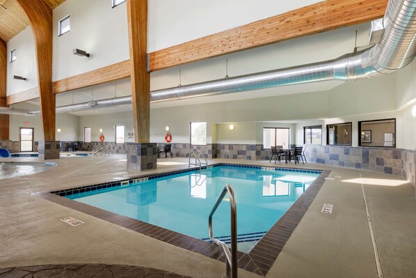 Indoor pool, open 7 AM to 11 PM, pool loungers