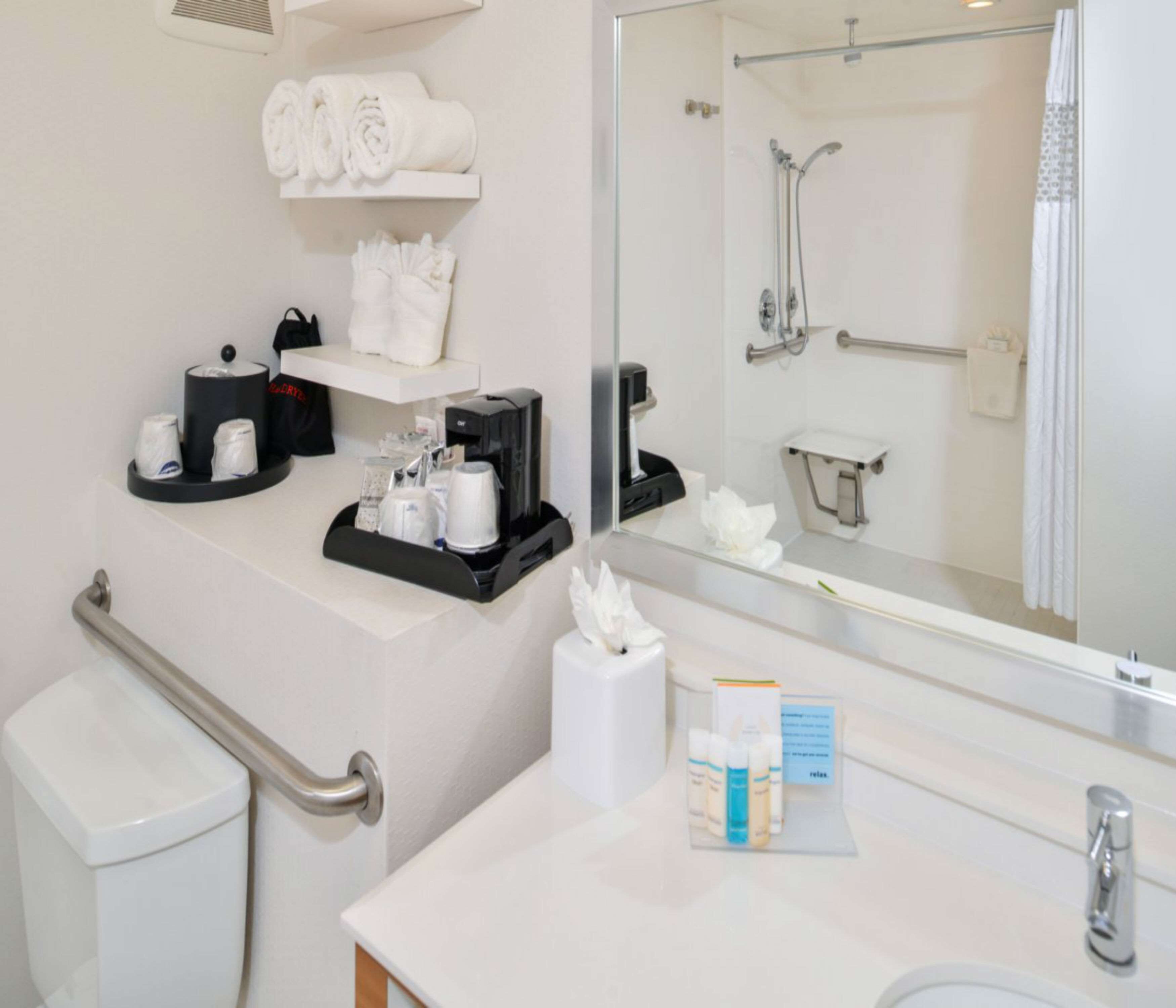 combined shower/bathtub, free toiletries, hair dryer, towels