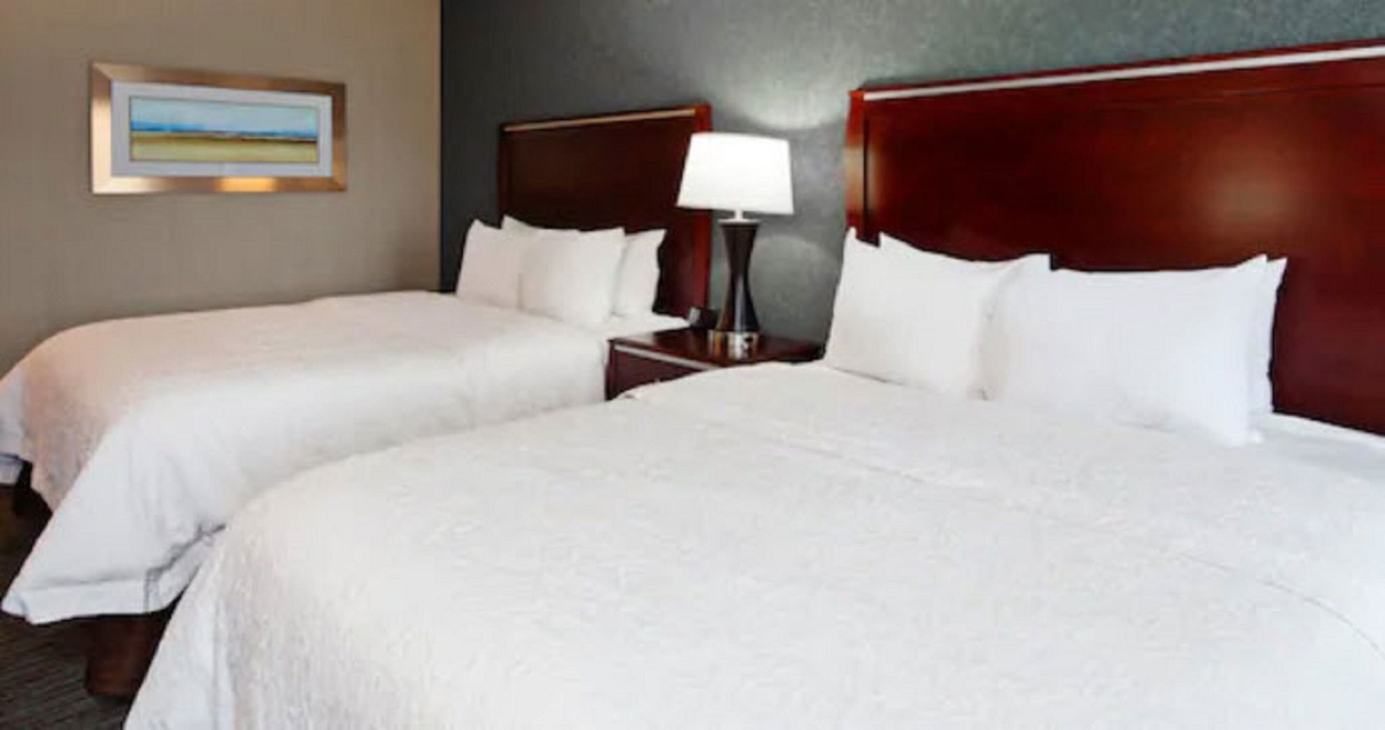 Premium bedding, pillowtop beds, desk, blackout drapes