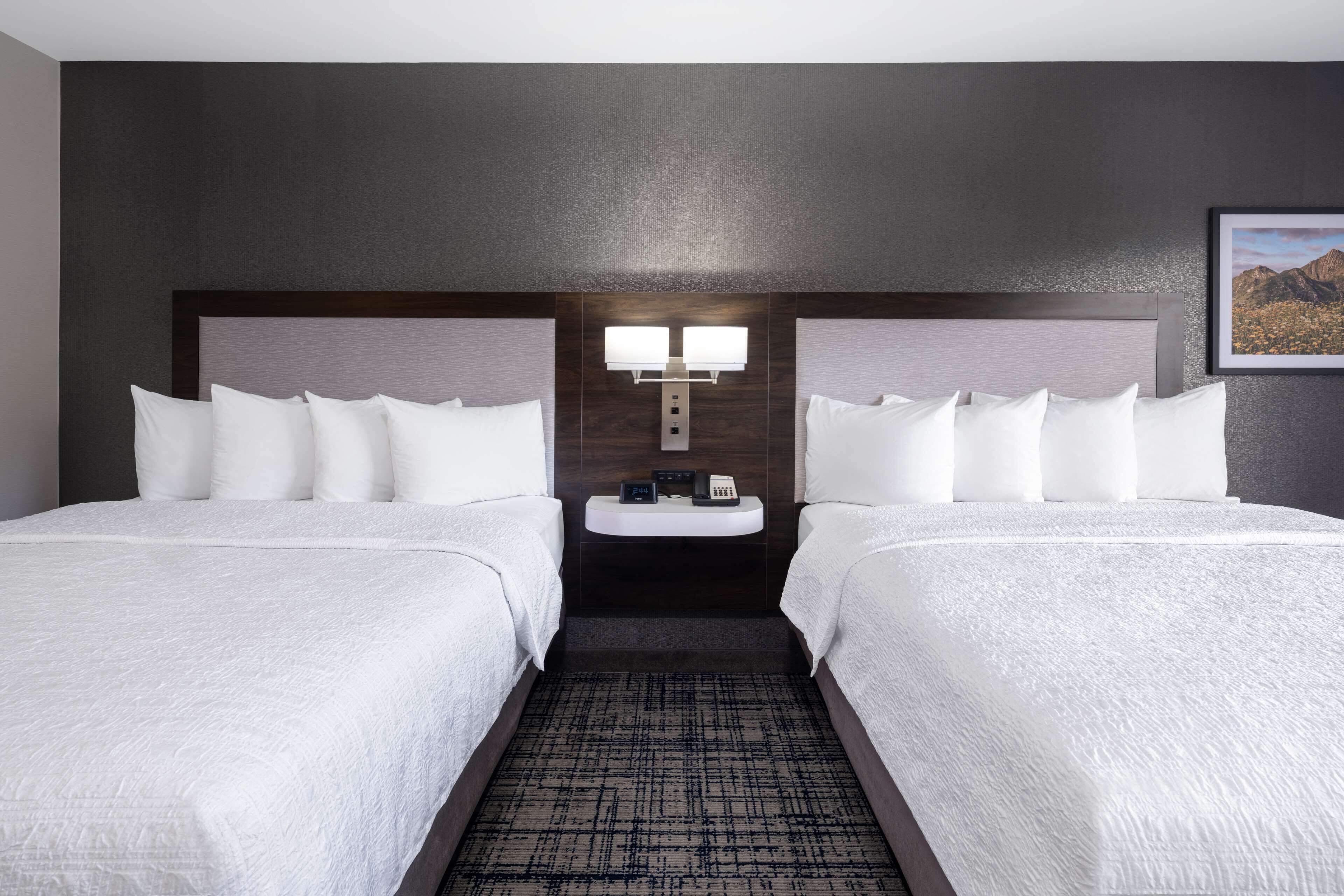 premium bedding, pillow-top beds, desk, blackout curtains