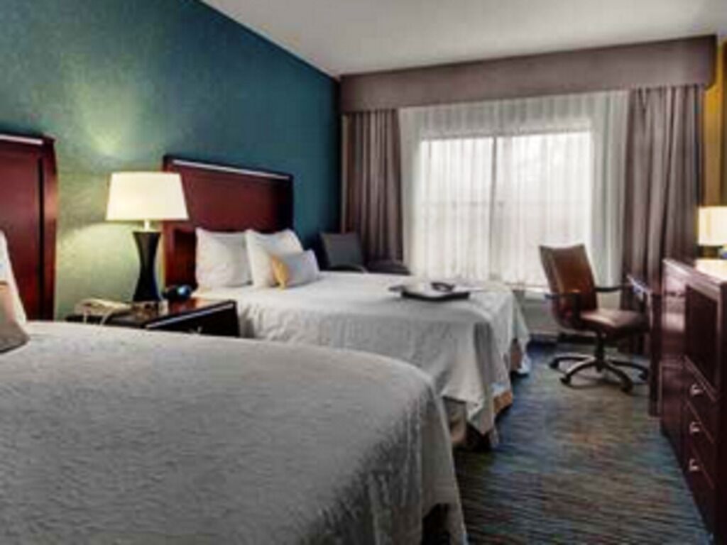 Premium bedding, pillowtop beds, desk, blackout drapes