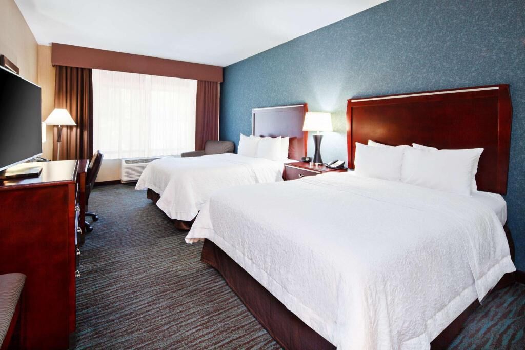 Premium bedding, pillowtop beds, desk, blackout drapes