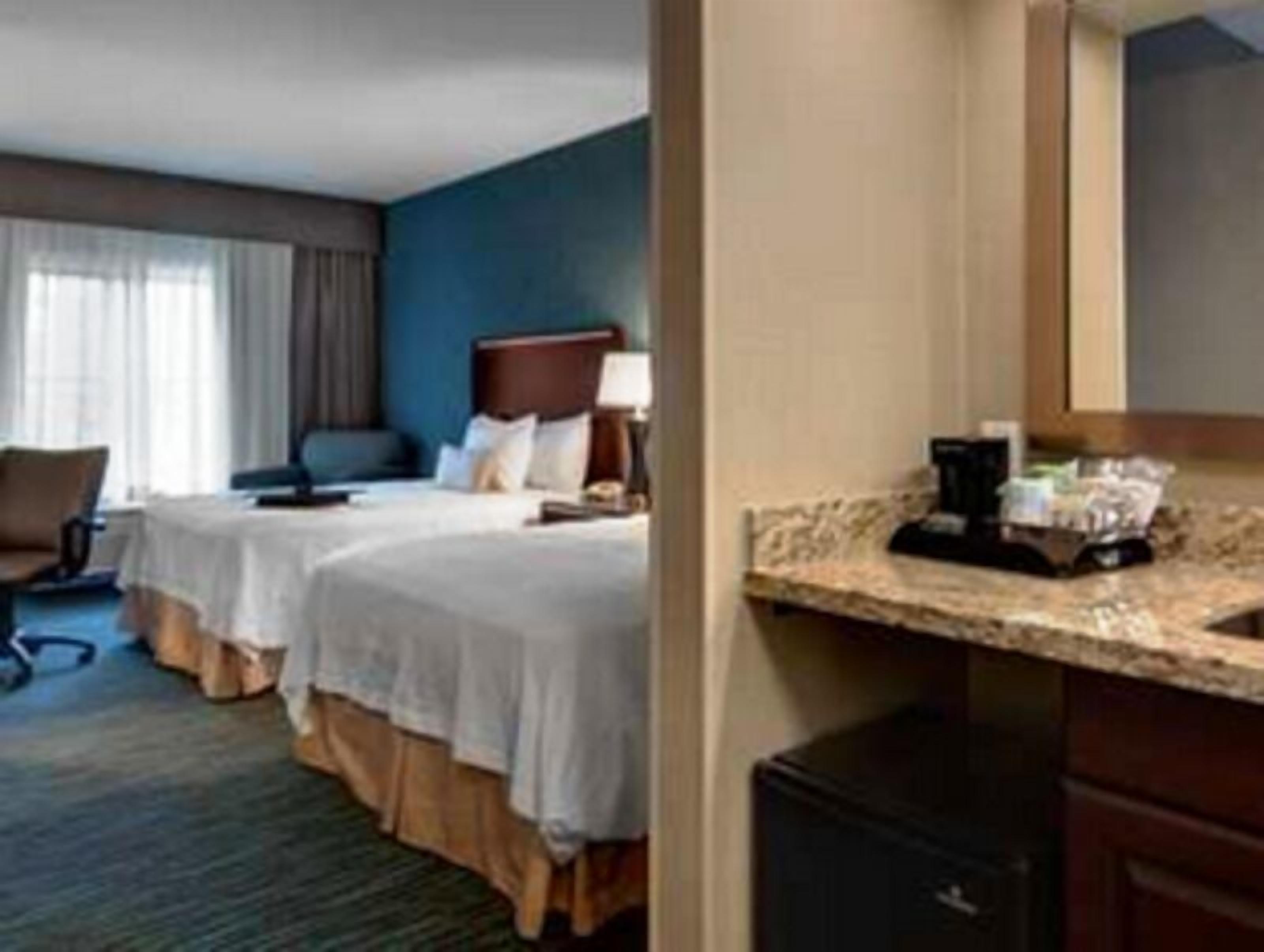 Premium bedding, pillowtop beds, desk, blackout drapes