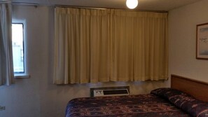 Classic Room | Individually decorated, individually furnished, desk, blackout drapes - National 9 Inn Sand Canyon (Cortez)