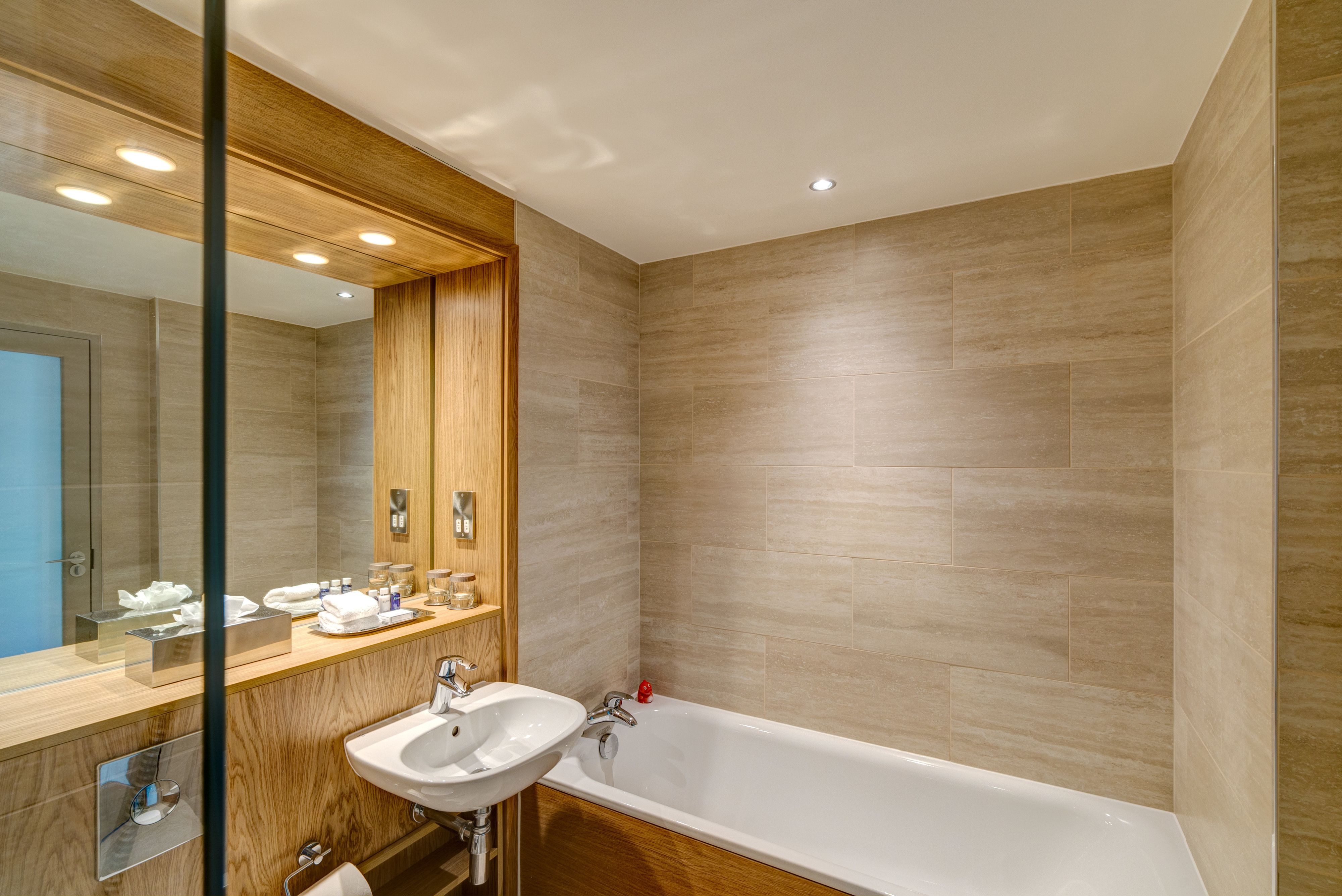 quay view superior room | bathroom | separate bathtub and shower, eco-friendly toiletries, hair dryer, towels
