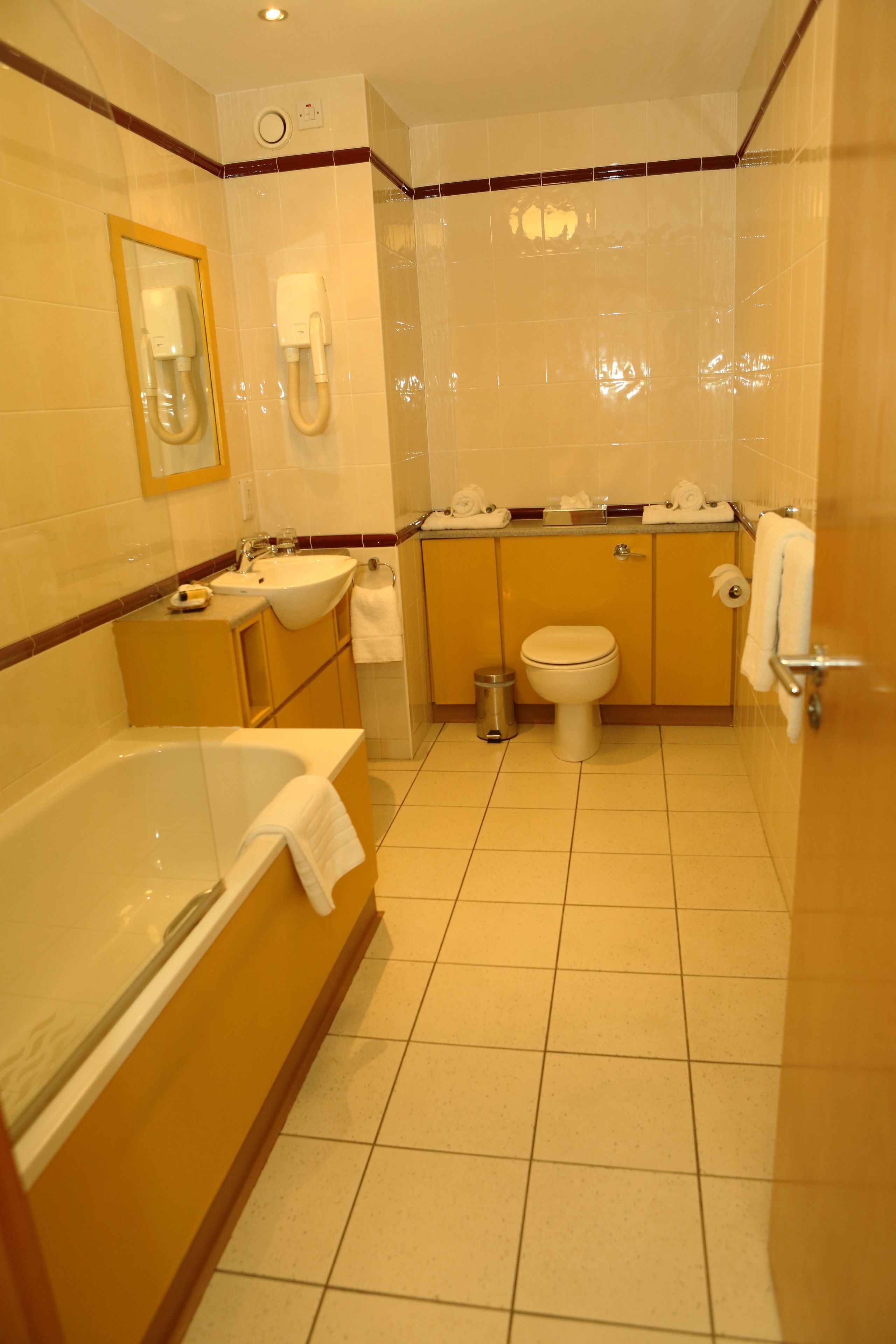 combined shower/bathtub, free toiletries, hair dryer, towels
