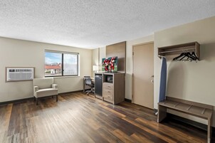 Suite, 1 King Bed, Non Smoking | Desk, blackout drapes, iron/ironing board, cribs (free)