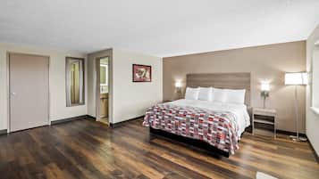 Suite, 1 King Bed, Non Smoking | Desk, blackout drapes, iron/ironing board, free cribs/infant beds