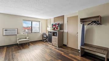Suite, 1 King Bed, Non Smoking | Desk, blackout drapes, iron/ironing board, free cribs/infant beds