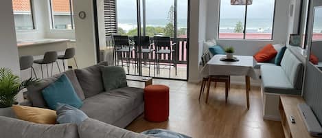 Apartment, 2 Bedrooms, Ocean View | Living area | 68-cm flat-screen TV with digital channels, TV