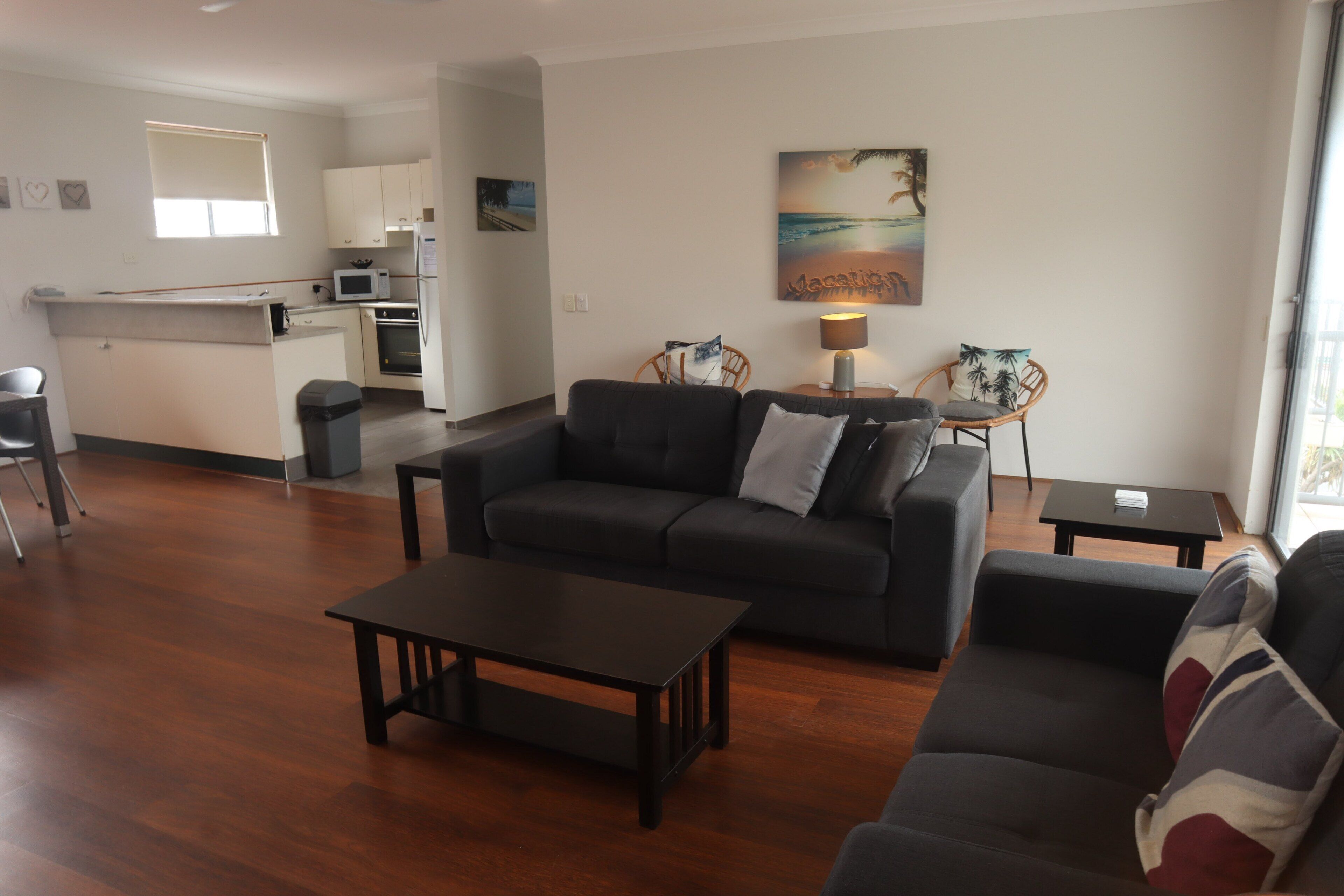 apartment, 2 bedrooms, ocean view | living area | 68-cm flat-screen tv with digital channels, tv