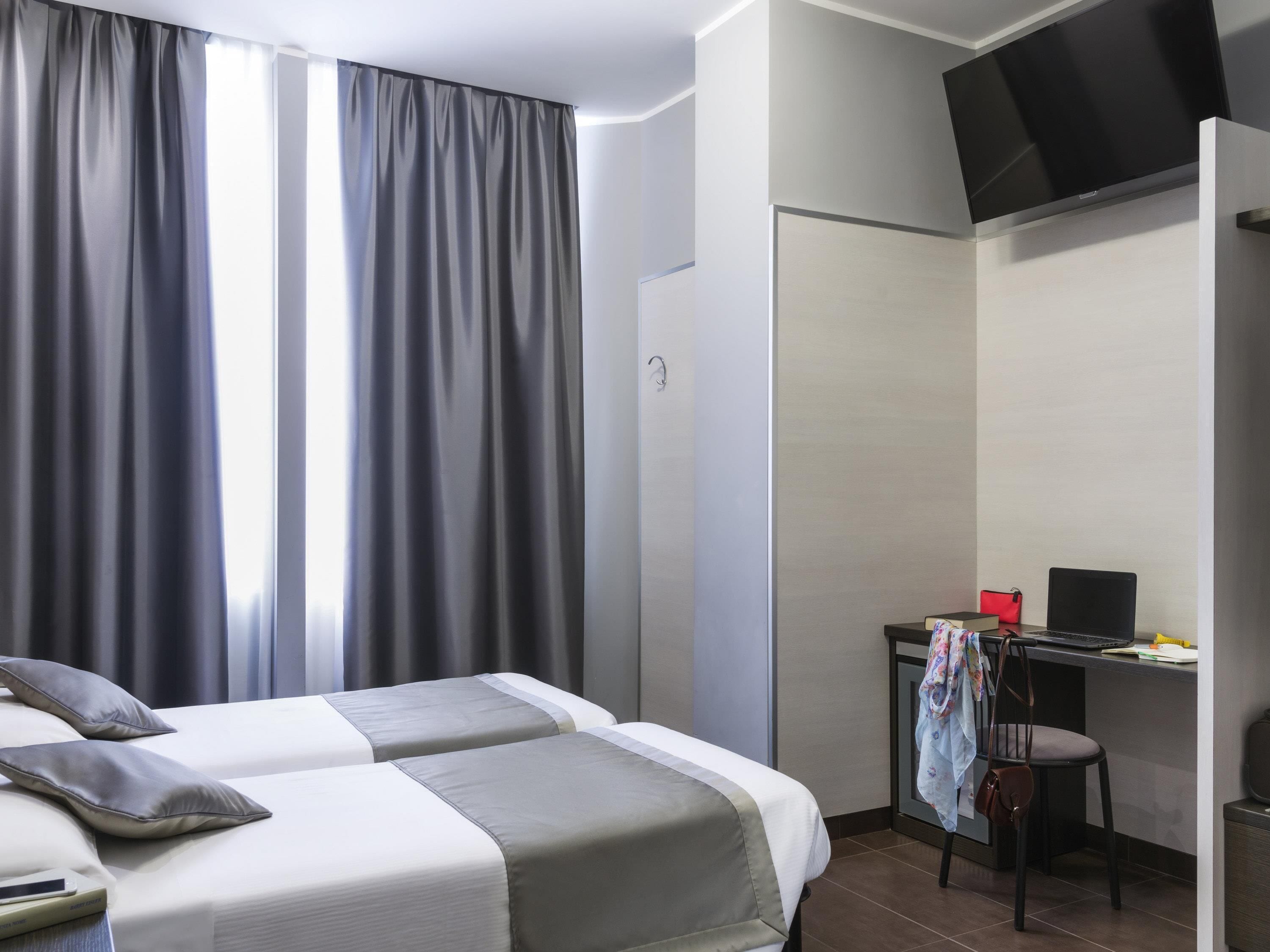 Habitación con 2 camas individuales, 2 camas individuales | Ropa de cama de alta calidad, edredón y minibar 