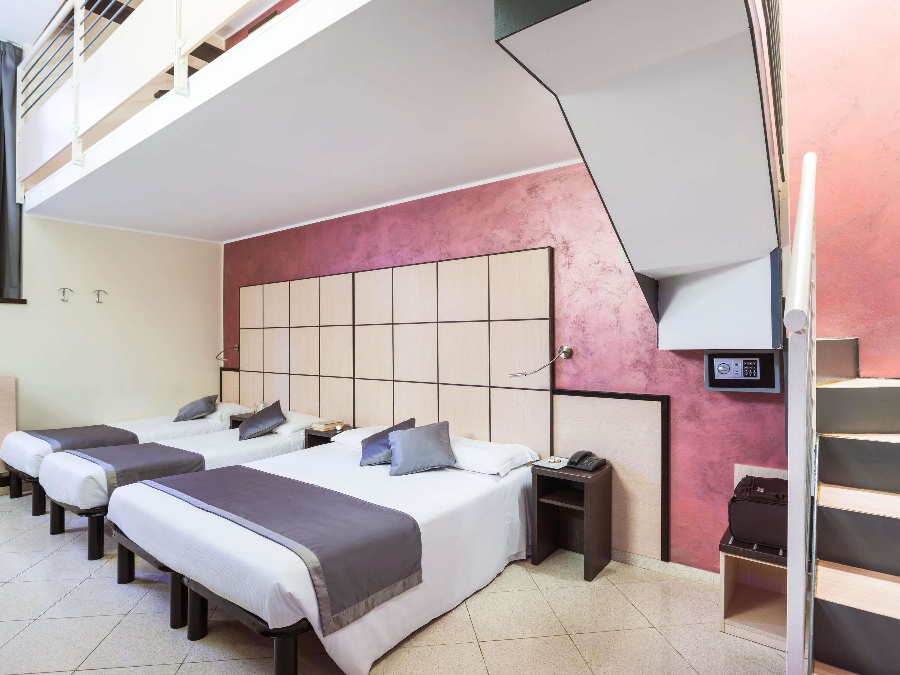 Premium bedding, down comforters, minibar, in-room safe