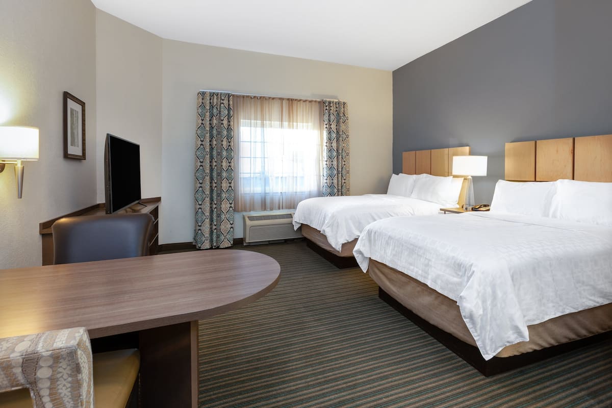 Studio Suite, 2 Double Beds | Desk, blackout drapes, soundproofing, iron/ironing board