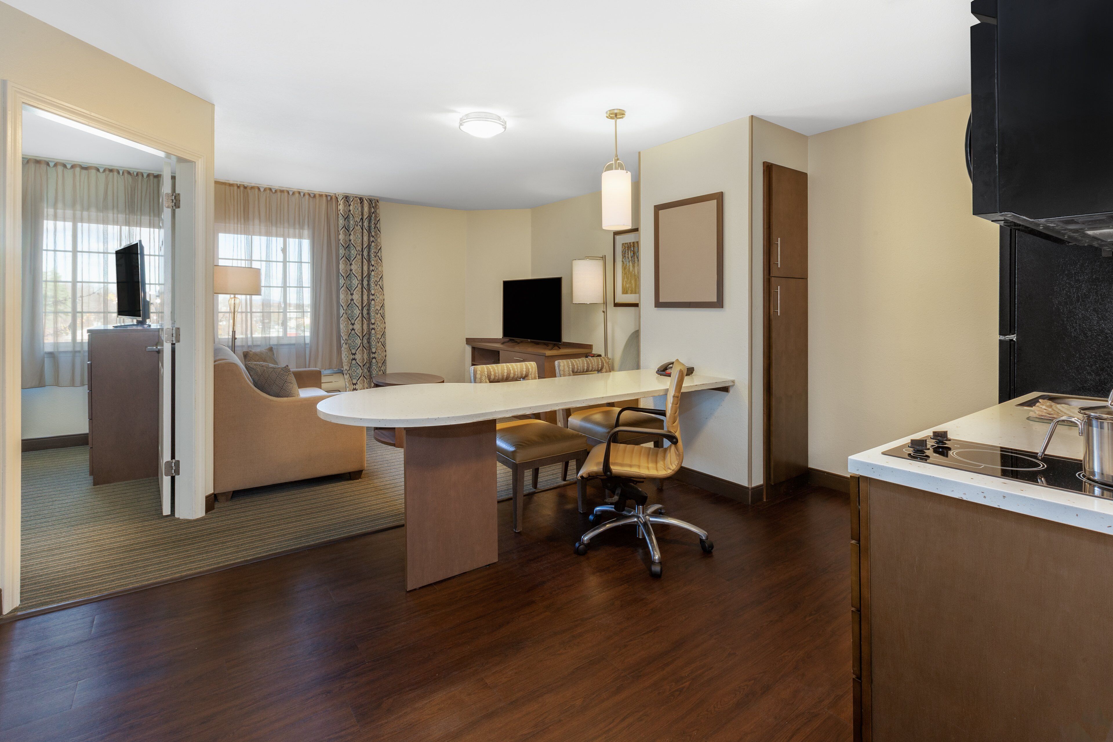 Suite, 1 Bedroom | Desk, blackout drapes, soundproofing, iron/ironing board
