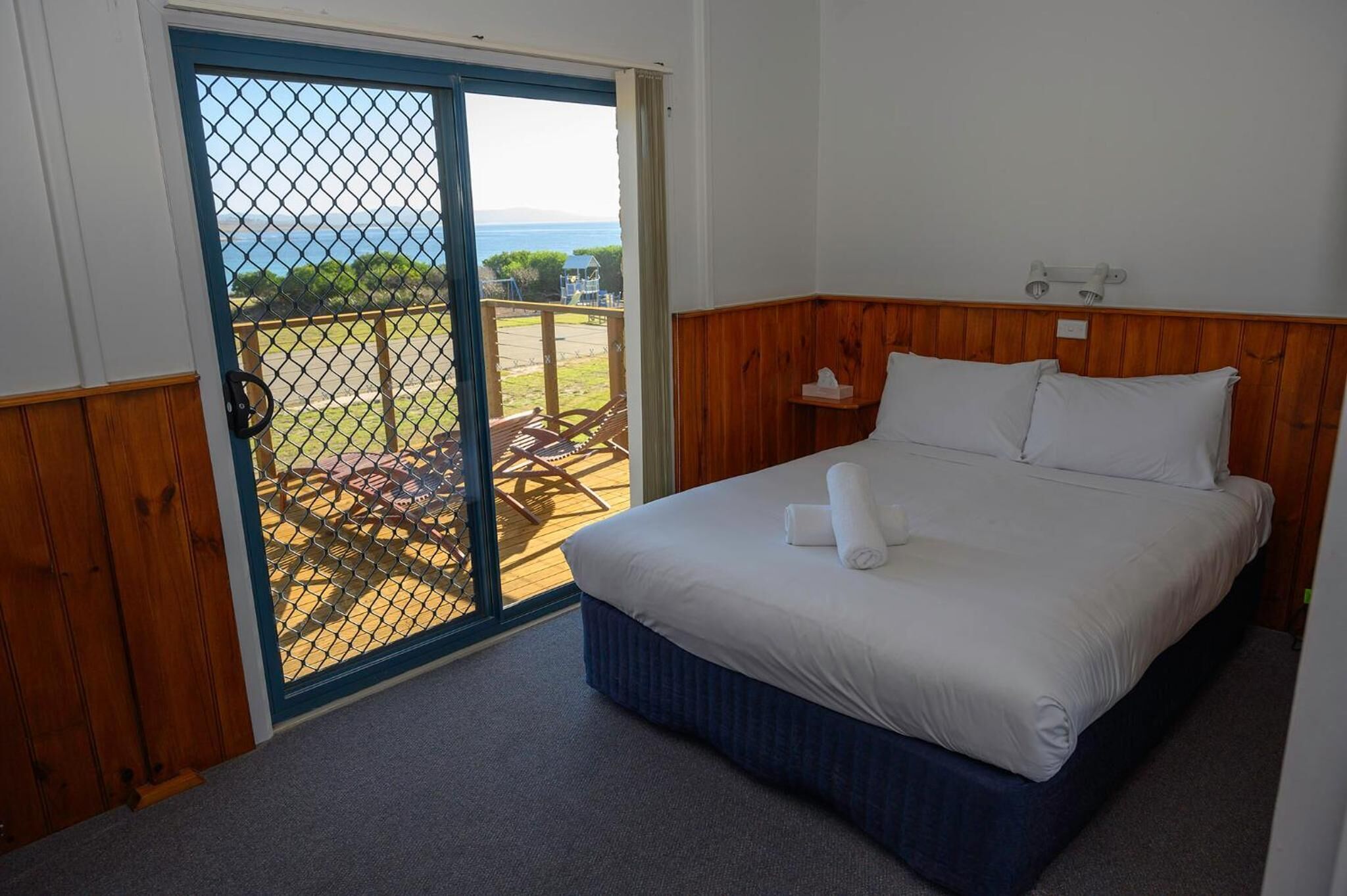 blackout curtains, iron/ironing board, bed sheets