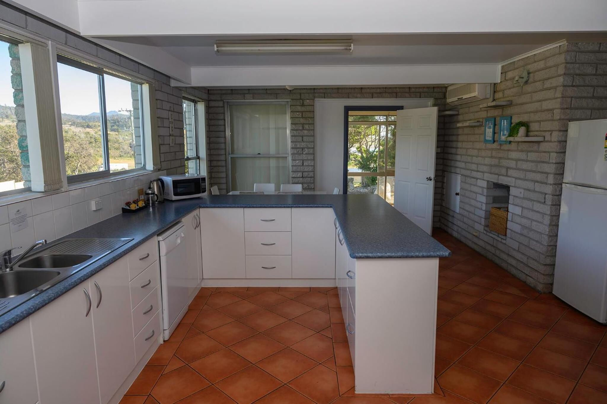 full-sized fridge, microwave, oven, stovetop