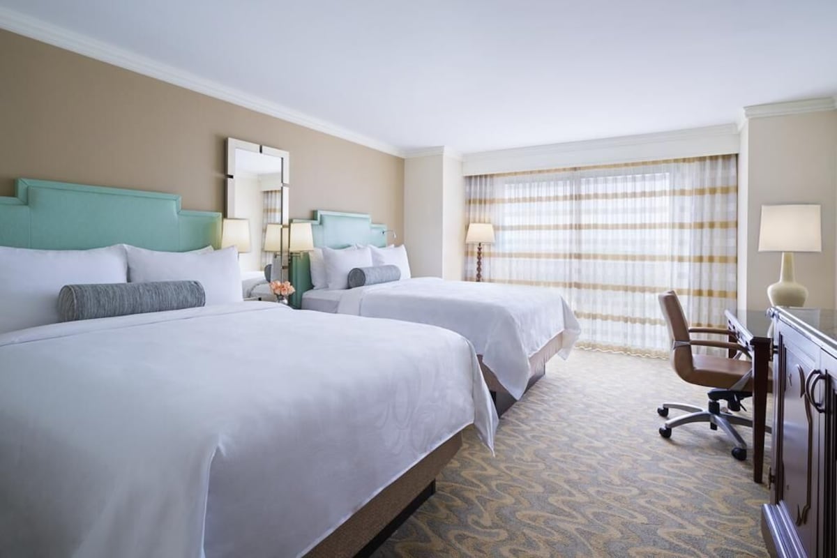 Pillowtop beds, in-room safe, desk, laptop workspace