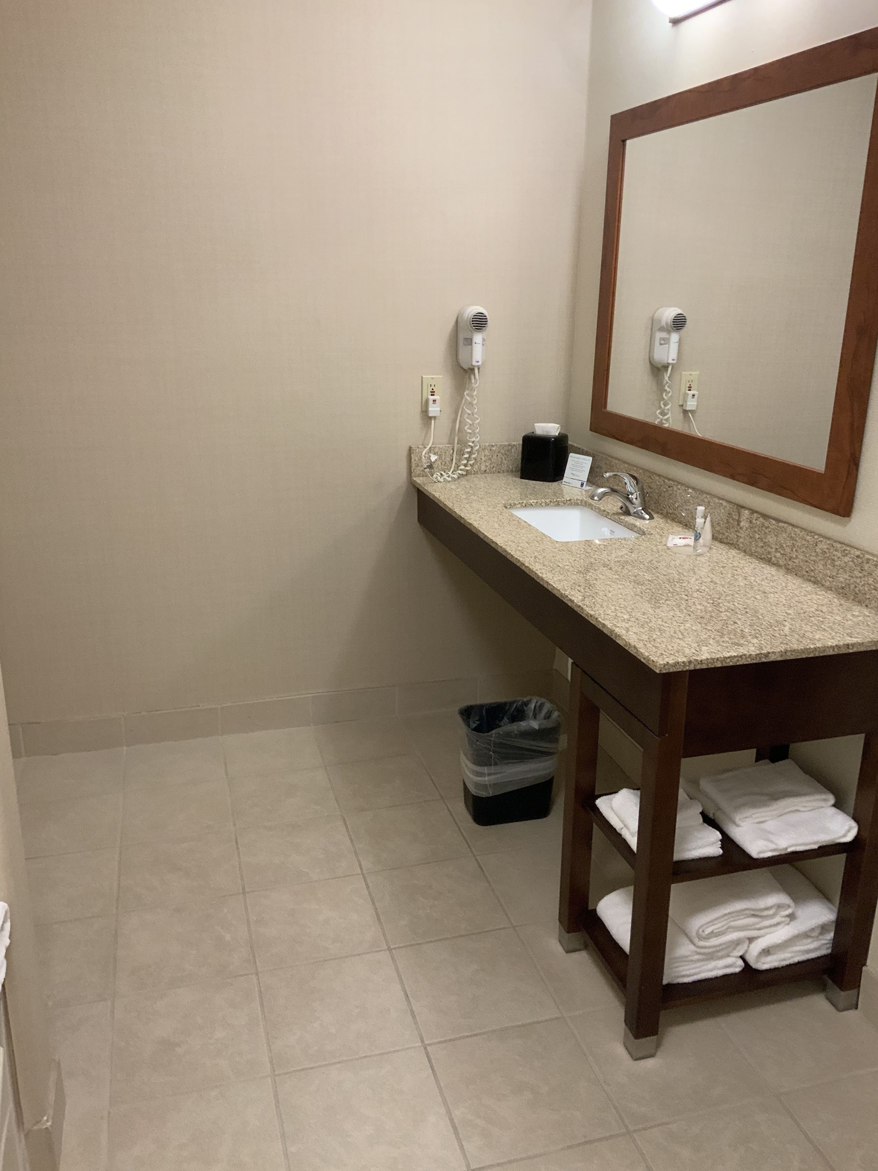 combined shower/bathtub, free toiletries, hair dryer, towels