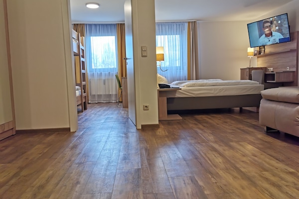 Family Room | Premium bedding, minibar, individually furnished, desk
