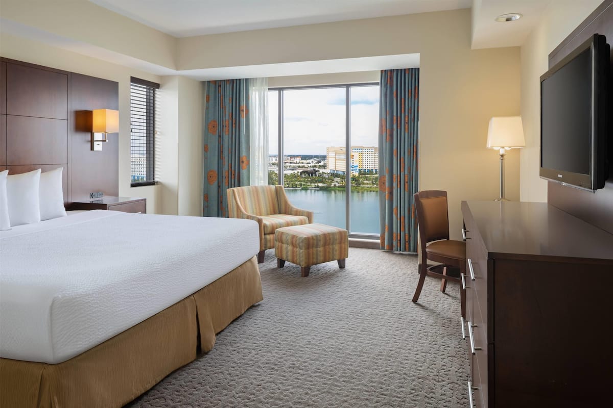 Premium bedding, laptop workspace, blackout drapes, soundproofing