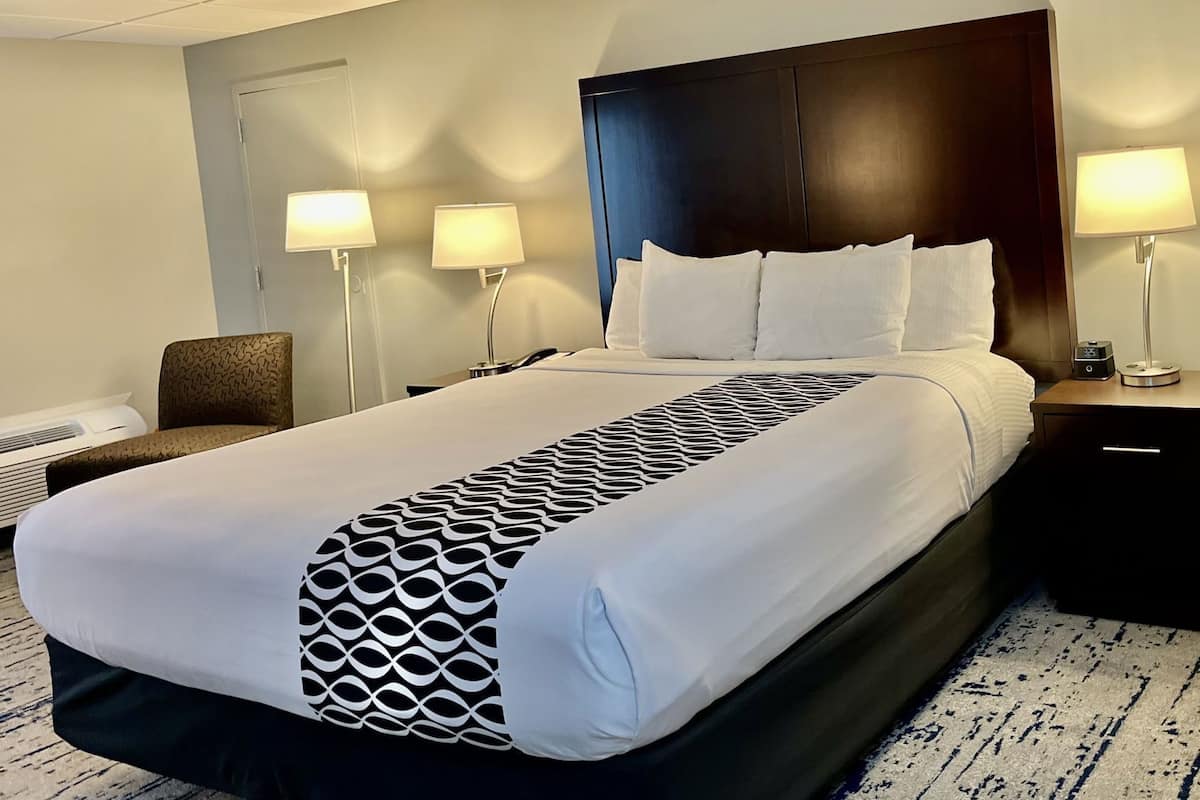 Premium bedding, desk, blackout drapes, iron/ironing board