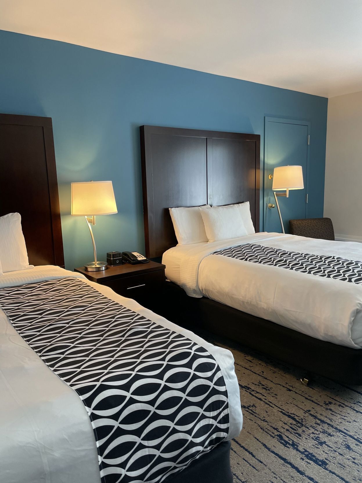 Premium bedding, desk, blackout drapes, iron/ironing board