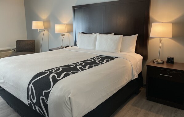 Premium bedding, desk, blackout drapes, iron/ironing board