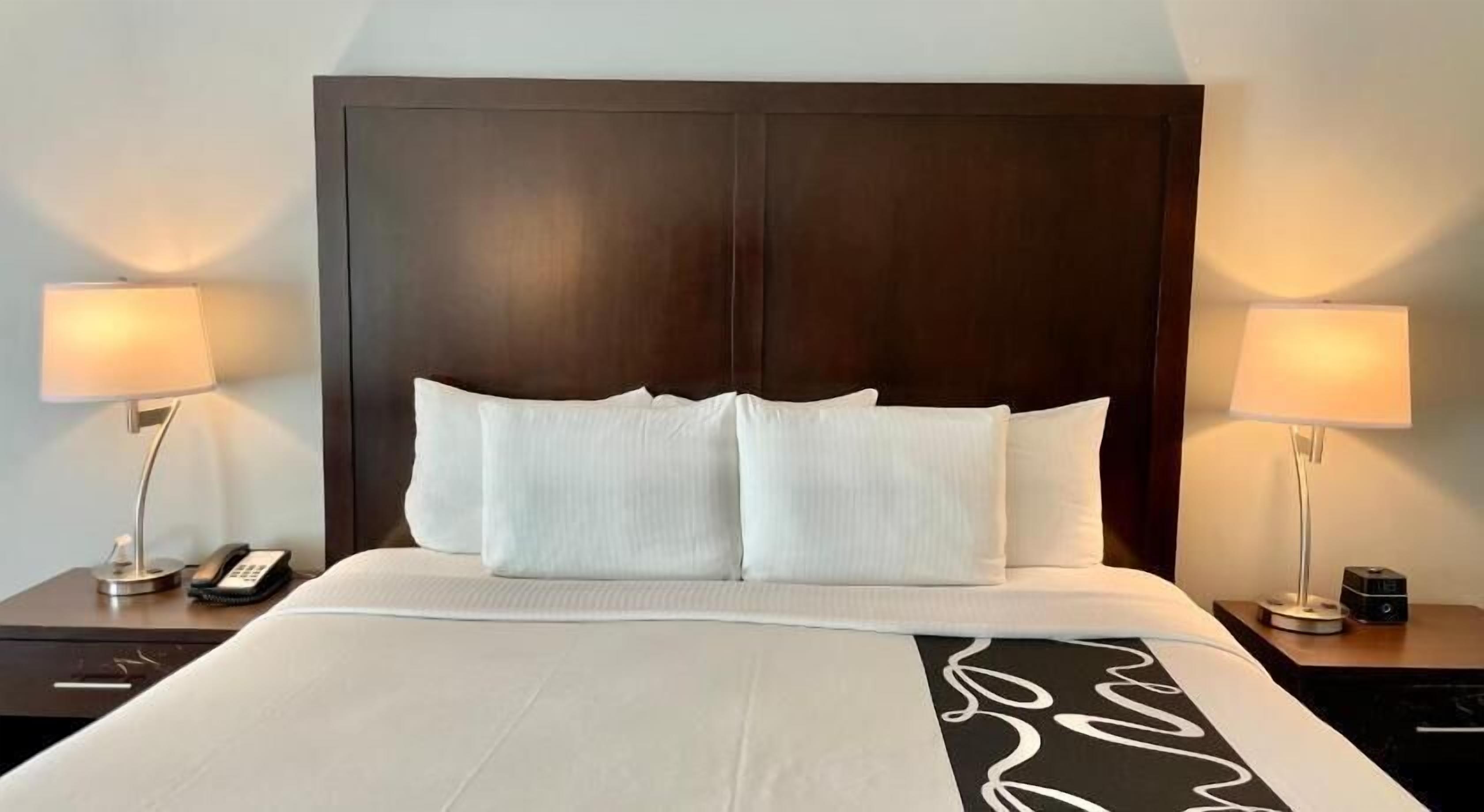 Premium bedding, desk, blackout drapes, iron/ironing board