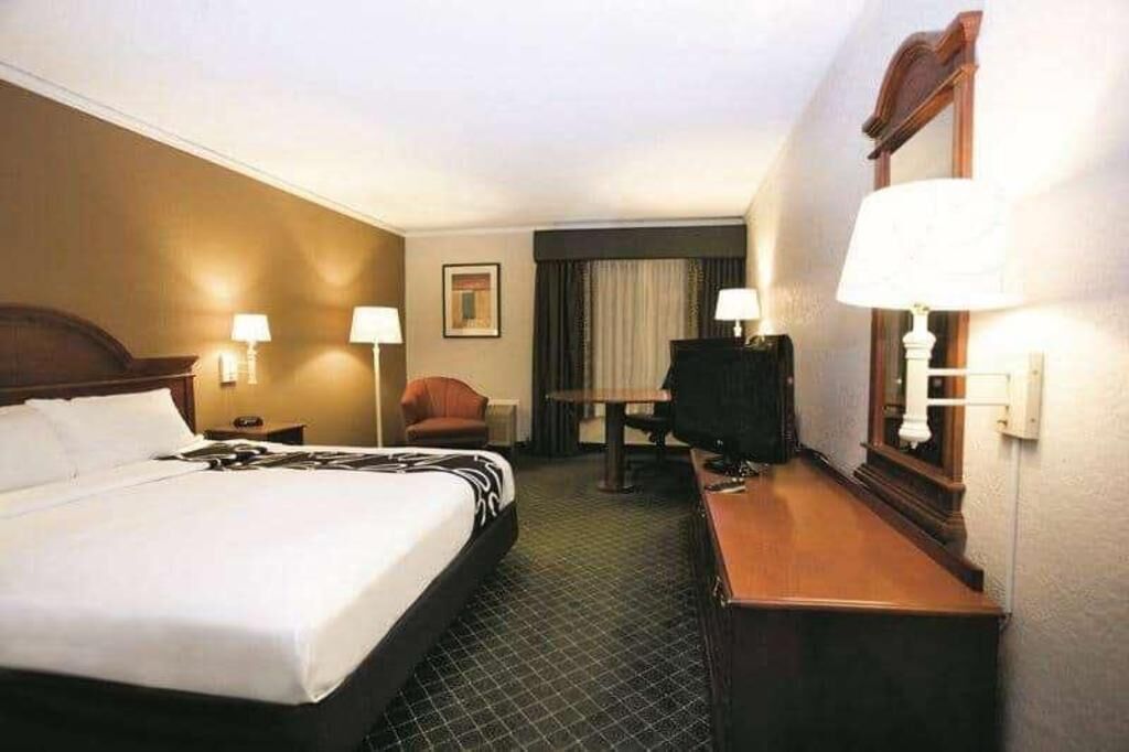Premium bedding, desk, blackout drapes, iron/ironing board