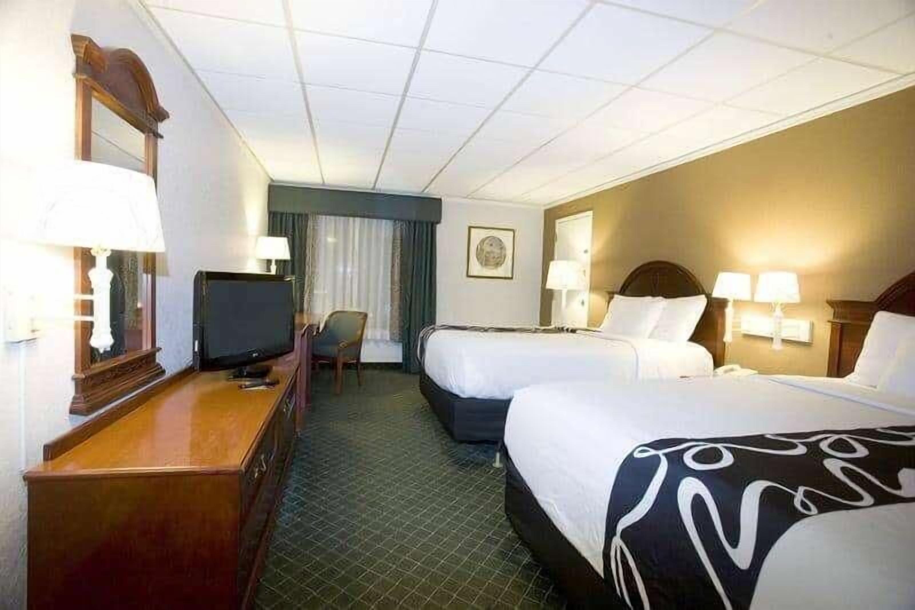 Premium bedding, desk, blackout drapes, iron/ironing board