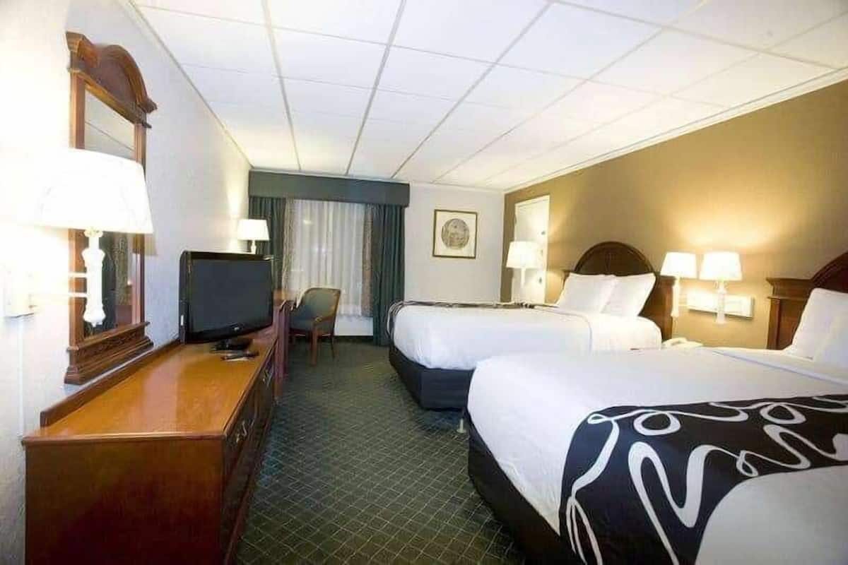 Premium bedding, desk, blackout drapes, iron/ironing board