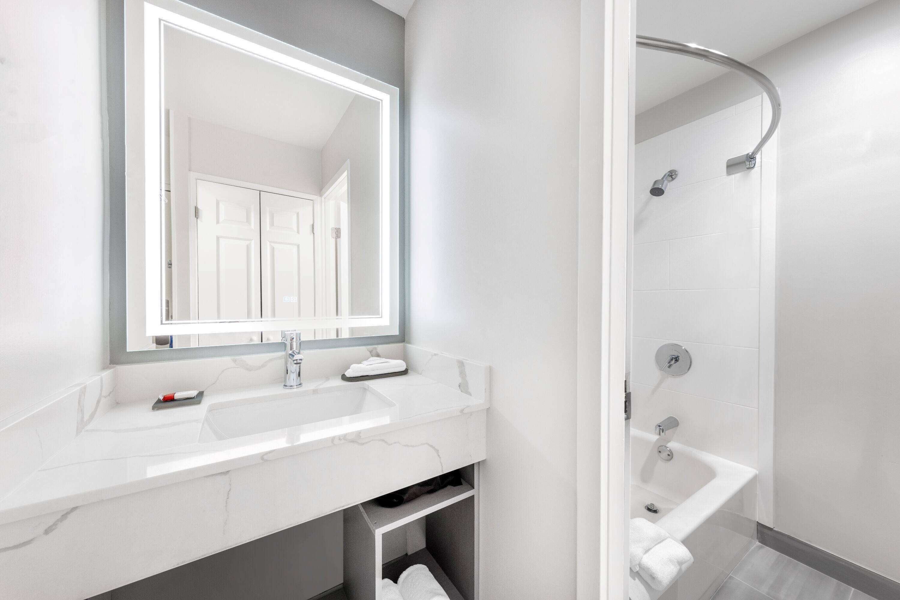 combined shower/bathtub, free toiletries, hair dryer, towels