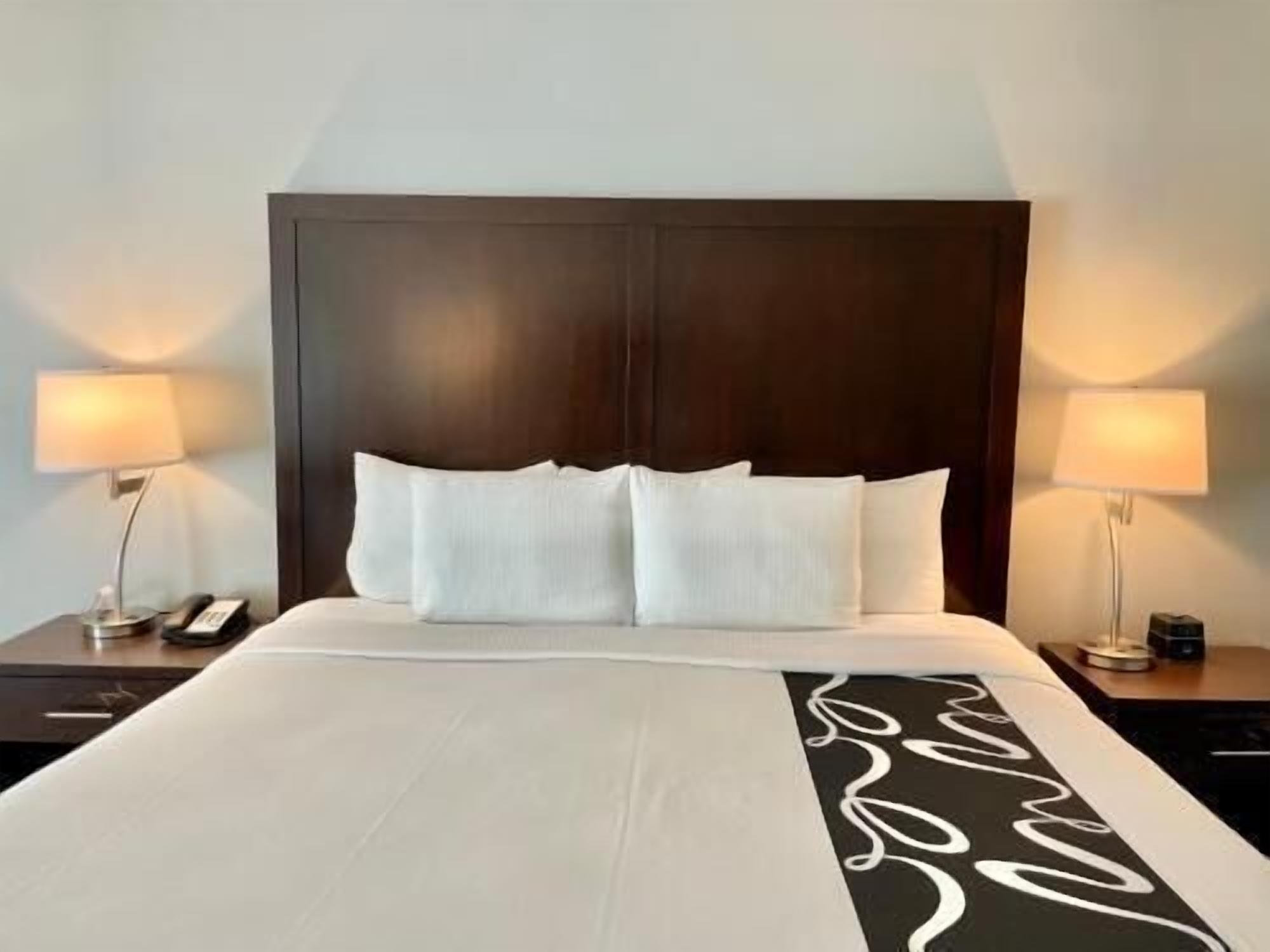 Premium bedding, desk, blackout drapes, iron/ironing board