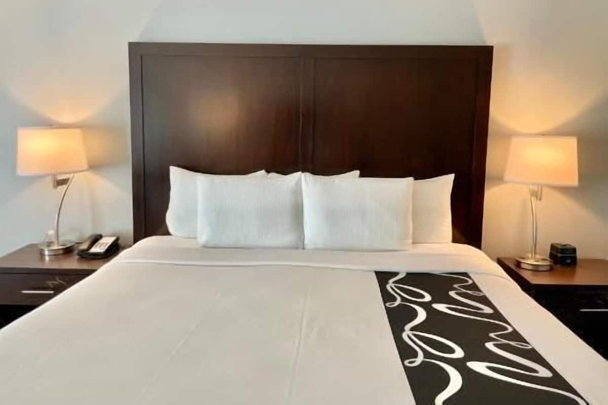 Premium bedding, desk, blackout drapes, iron/ironing board