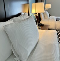 Premium bedding, desk, blackout drapes, iron/ironing board