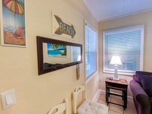 Suite, 1 King Bed with Sofa bed | Living area | Flat-screen TV