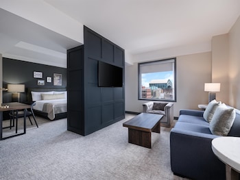 36-inch TV with premium channels at The Sam Houston Hotel, Tapestry Collection by Hilton