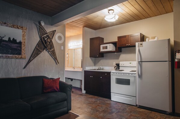 Suite, niet-roken | Een bureau, een strijkplank/strijkijzer, extra bedden (toeslag)