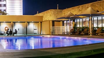 Outdoor pool, open 6:00 AM to 7:00 PM, pool loungers