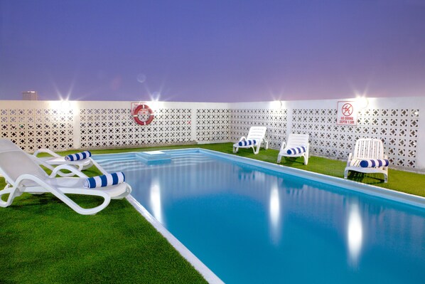 Outdoor pool, sun loungers