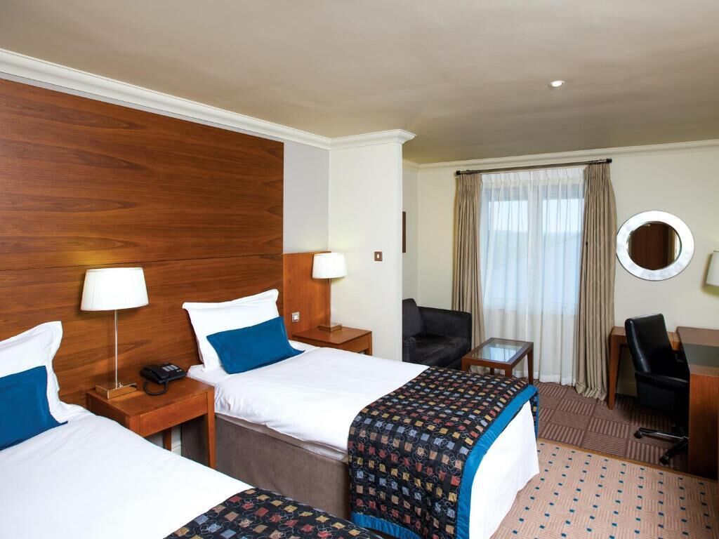 Hypo-allergenic bedding, in-room safe, desk, laptop workspace
