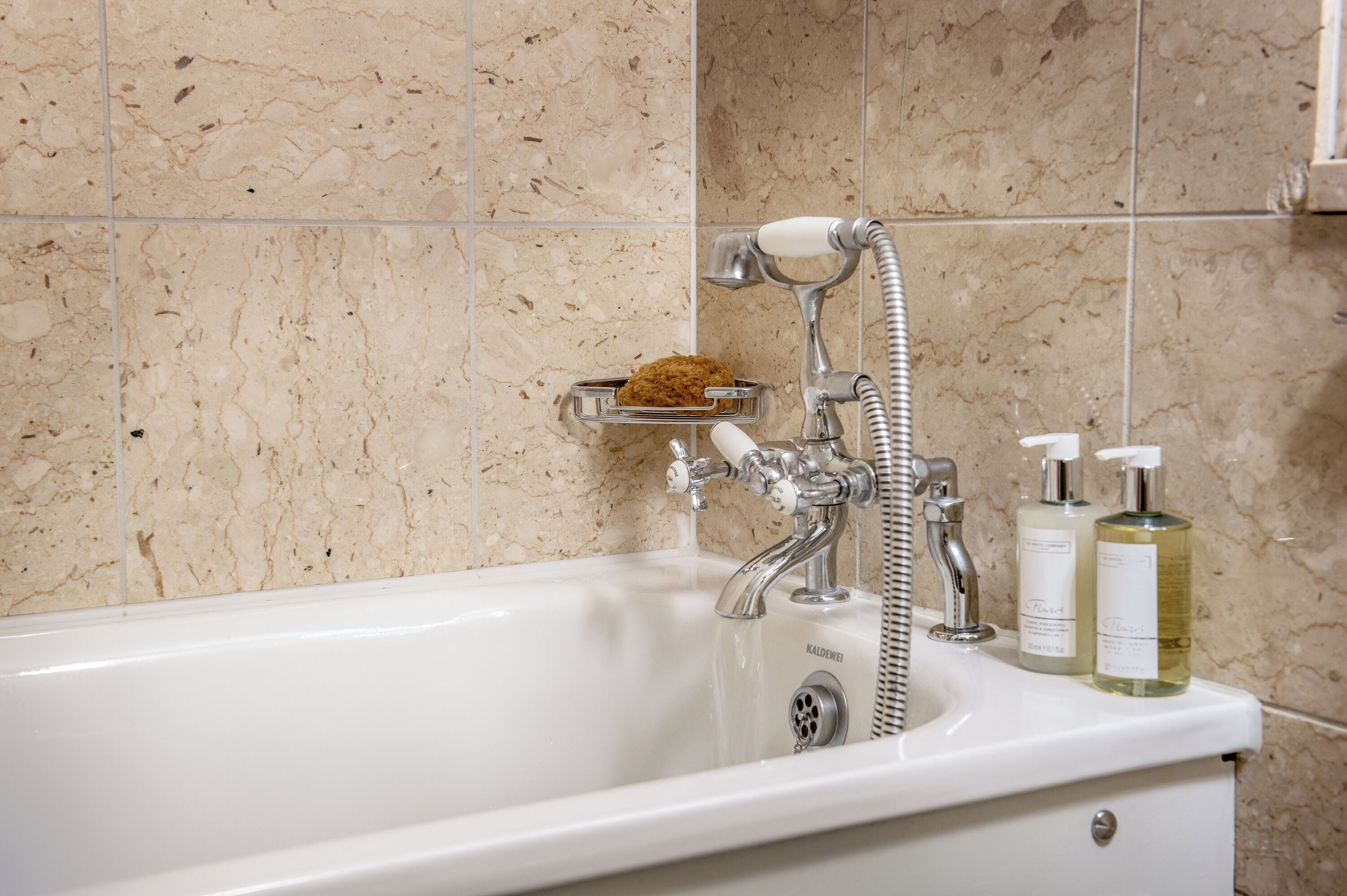 junior suite | bathroom | separate bathtub and shower, free toiletries, hair dryer, bathrobes