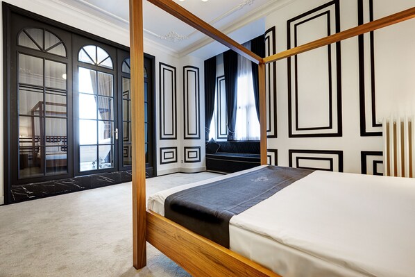 Deluxe Suite Room | Caja fuerte, wifi gratis, ropa de cama