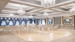 A spacious hall with rows of chairs, chandeliers, and large windows. - Ardboyne Hotel (Navan)
