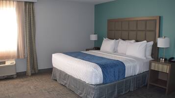 Desk, laptop workspace, iron/ironing board, free cribs/infant beds