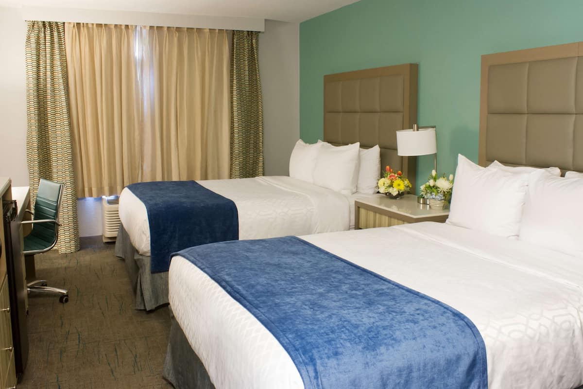 Standard Room, 2 Queen Beds, Non Smoking, Refrigerator & Microwave | Desk, laptop workspace, iron/ironing board, free cribs/infant beds