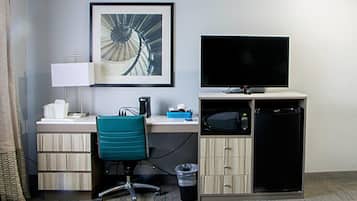 Desk, laptop workspace, iron/ironing board, free cribs/infant beds